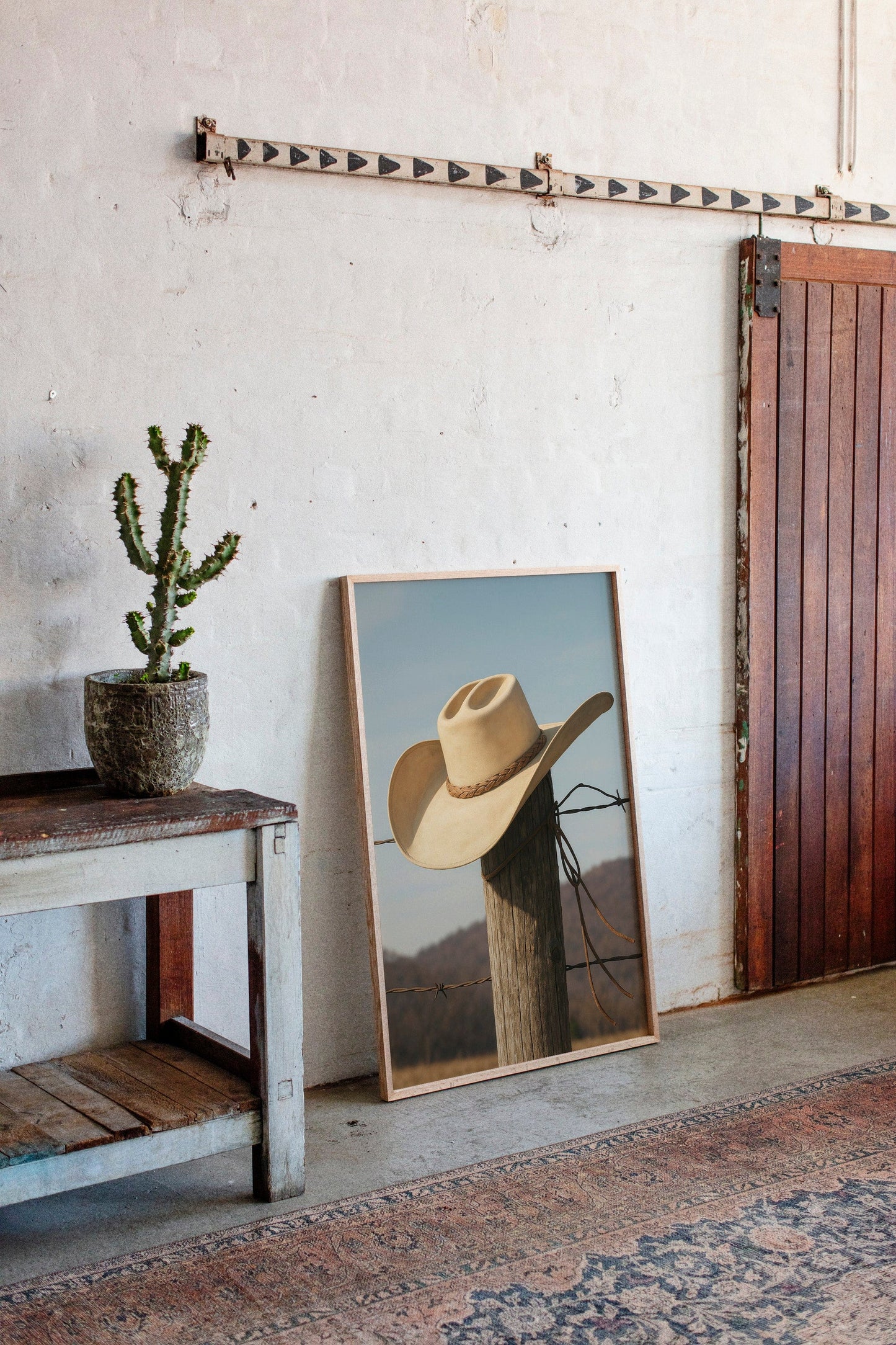 Cowboy Hat on Fence Post
