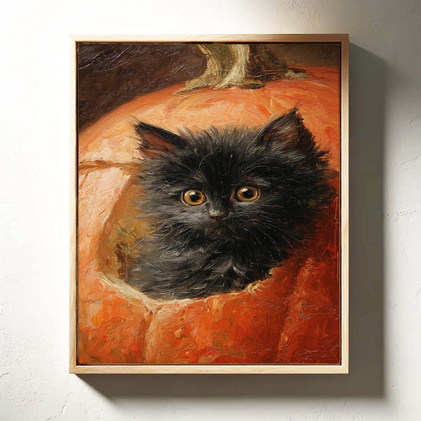 Curious Kitten in Pumpkin