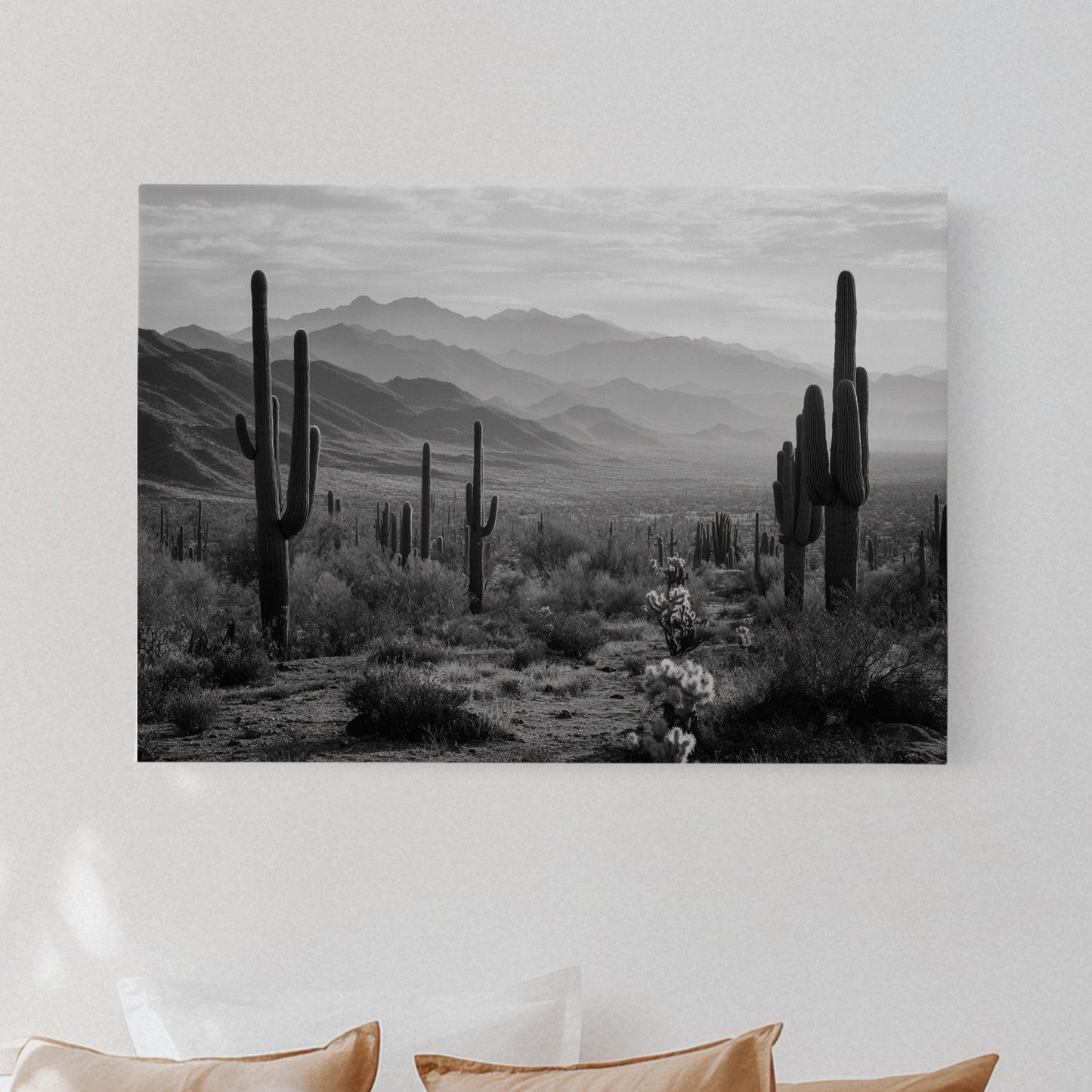 Bedroom with a large wall art print of a desert landscape featuring cacti.