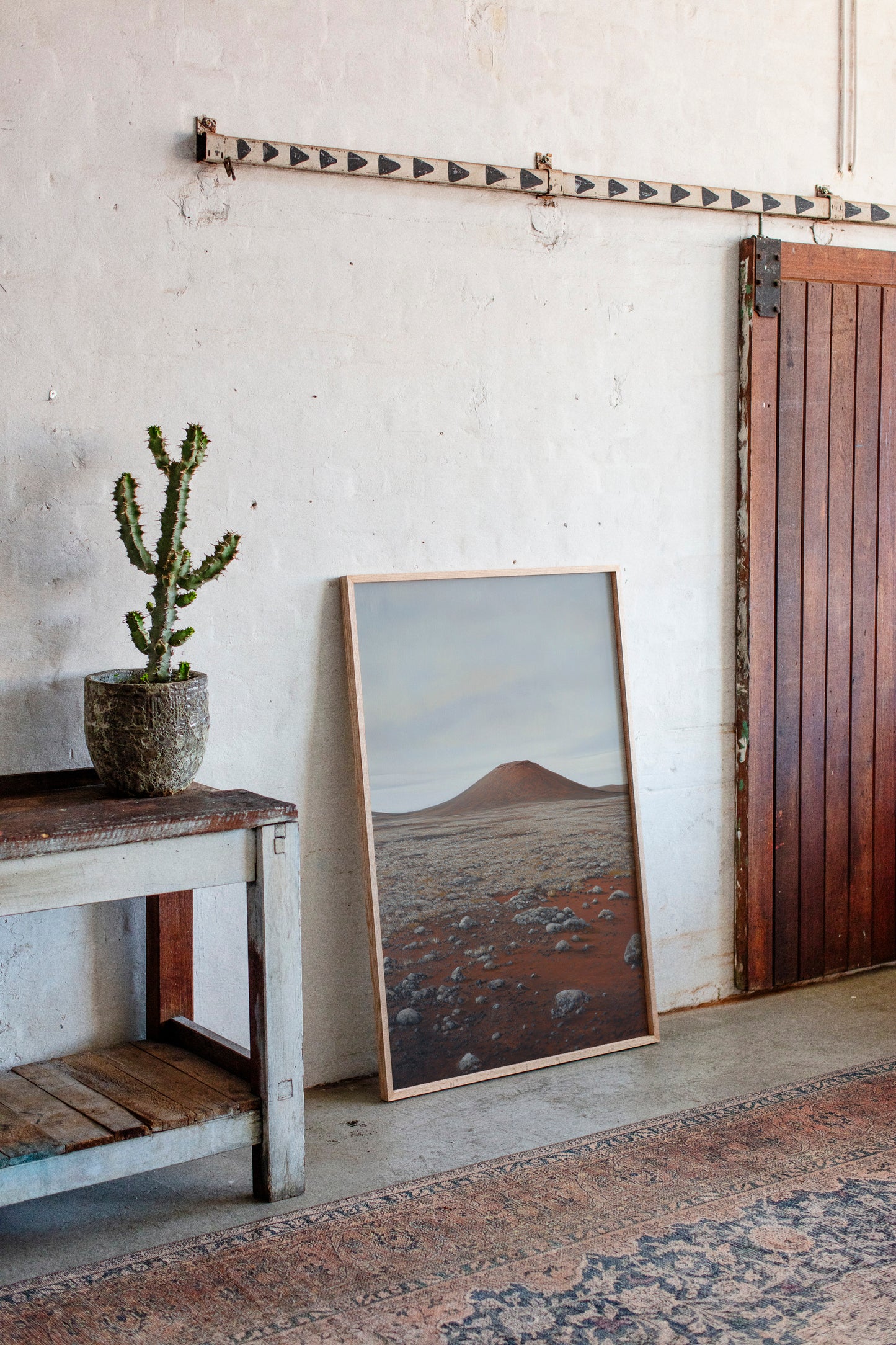 Solitary Peak In Rust And Stone