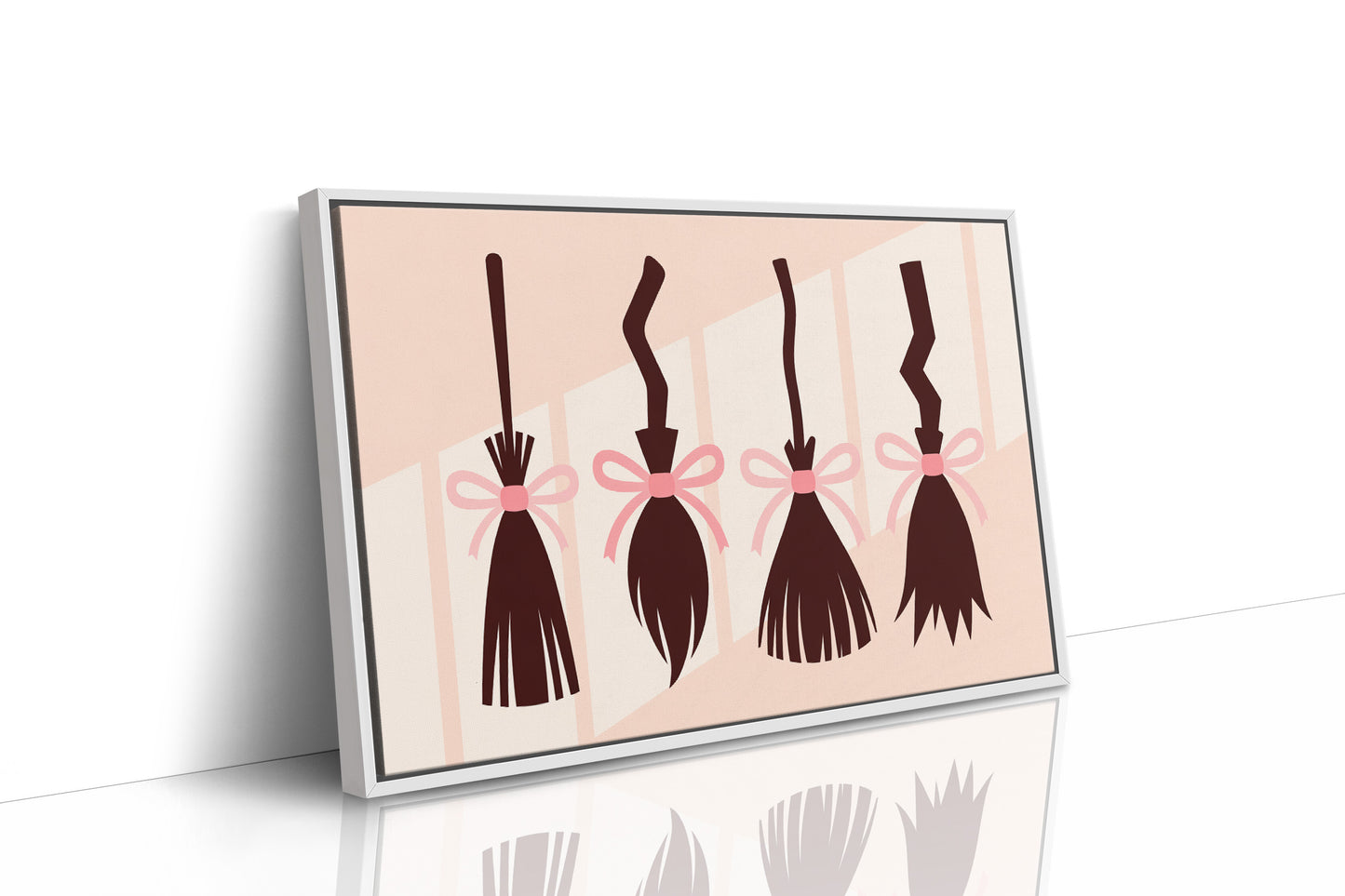 Brooms Tied With Pink Ribbons