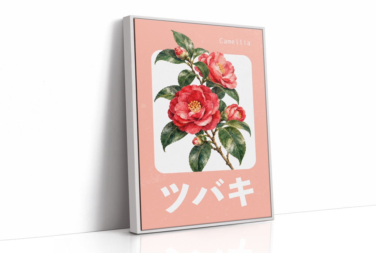 A Camellia Before Noon, a red camellia bloom with green leaves on a blush pink ground, with a rounded cream label and bold pale Japanese lettering, in a flat Japanese travel poster style painted in red, blush pink and cream, as a framed canvas in a white frame