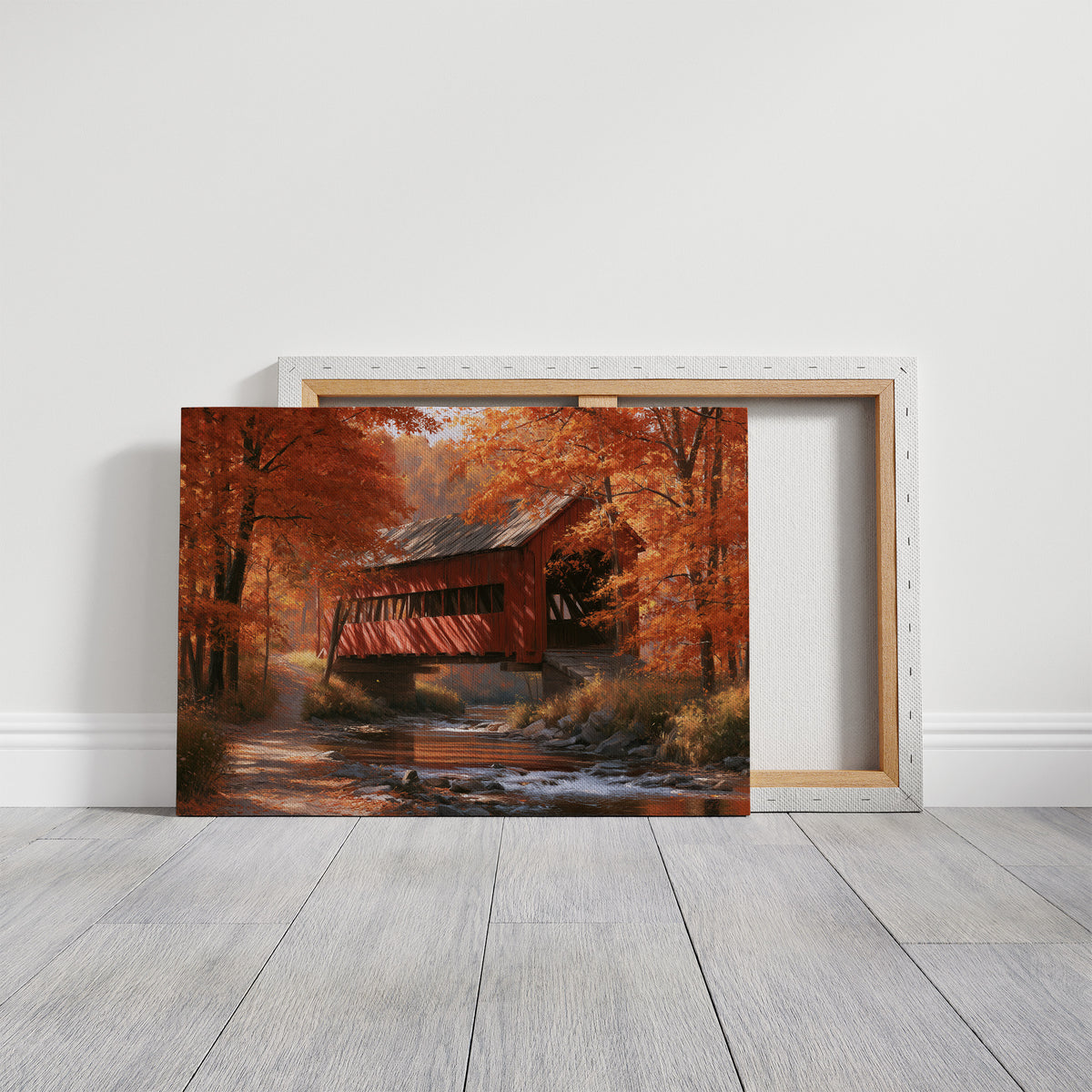 A Red Roof Over the Brook, a covered wooden bridge over a stream in a misty autumn forest, painted in rust, burnt orange and soft moss green, on a gallery canvas with wrapped edges leaning against a white wall