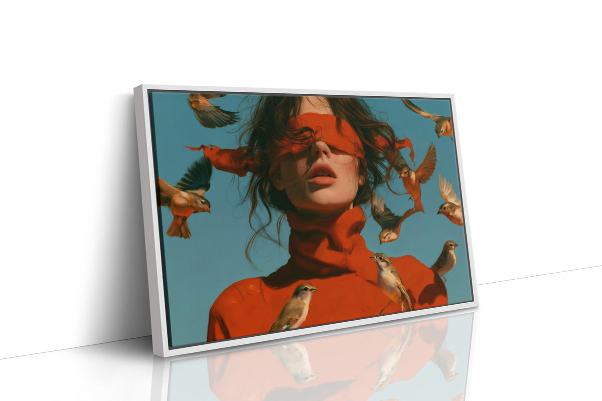A Veil the Wind Can Lift, a woman with a red silk scarf across her eyes and small golden birds rising around her head, painted in red, teal and gold, as a framed canvas in a white frame
