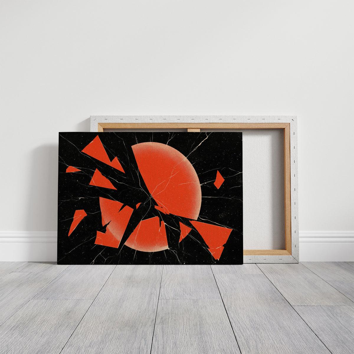 Everything Cracked, Nothing Dimmed, shattered red sun abstract on black, on a gallery canvas with wrapped edges leaning against a white wall