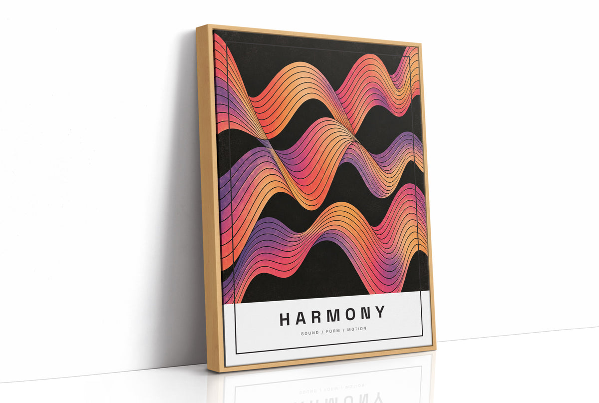 Harmony in Ember and Plum, rolling wavy bands of orange, magenta, violet and gold in fine contour lines on a deep black ground, with the word HARMONY in spaced black capitals on a cream label at the base, as a framed canvas in a natural wood frame