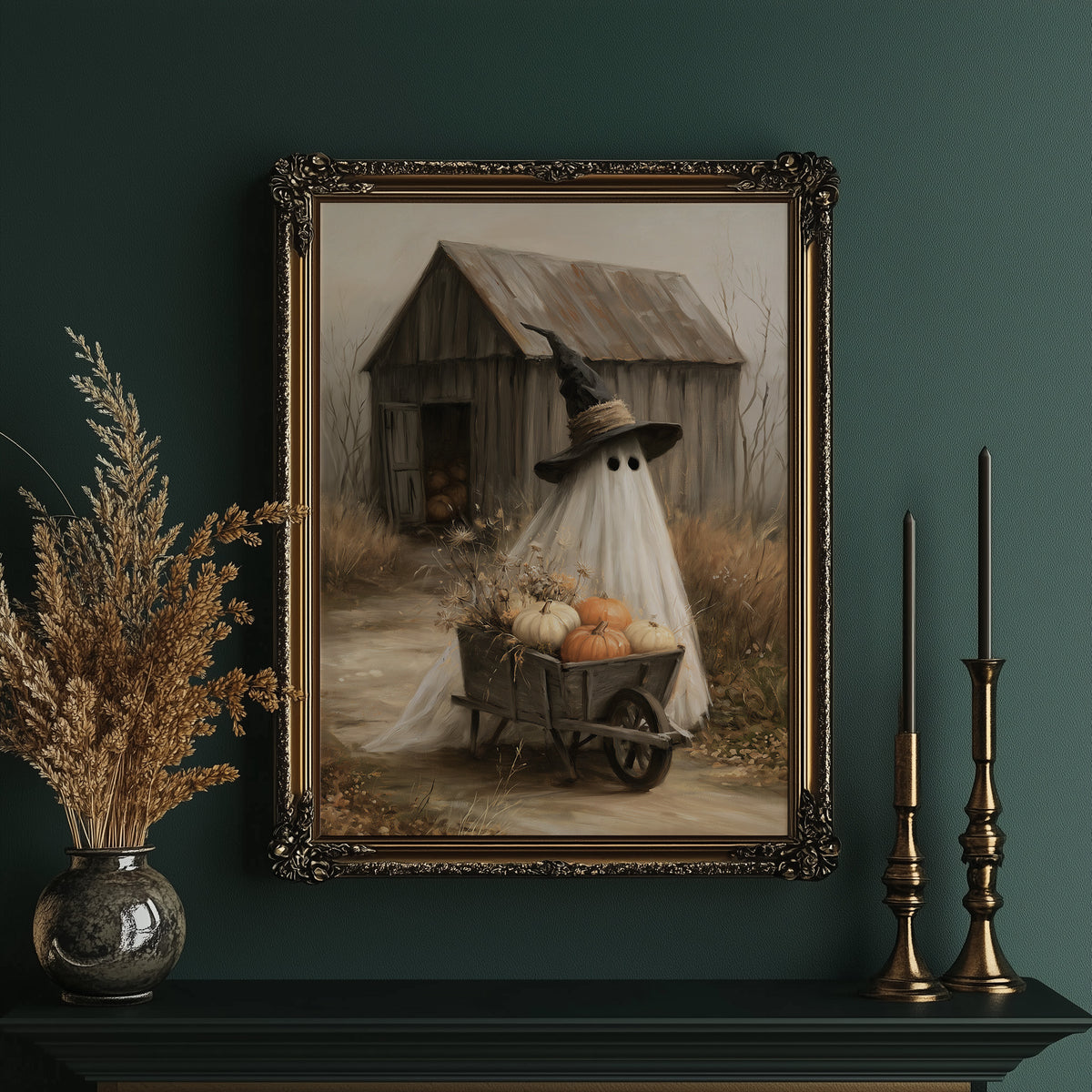 Just Passing Through, Boo, a ghost in a witch hat pushing a wheelbarrow of pumpkins past a weathered shed, painted in straw, gray and pale white, in an ornate gold frame on a deep green wall beside brass candlesticks