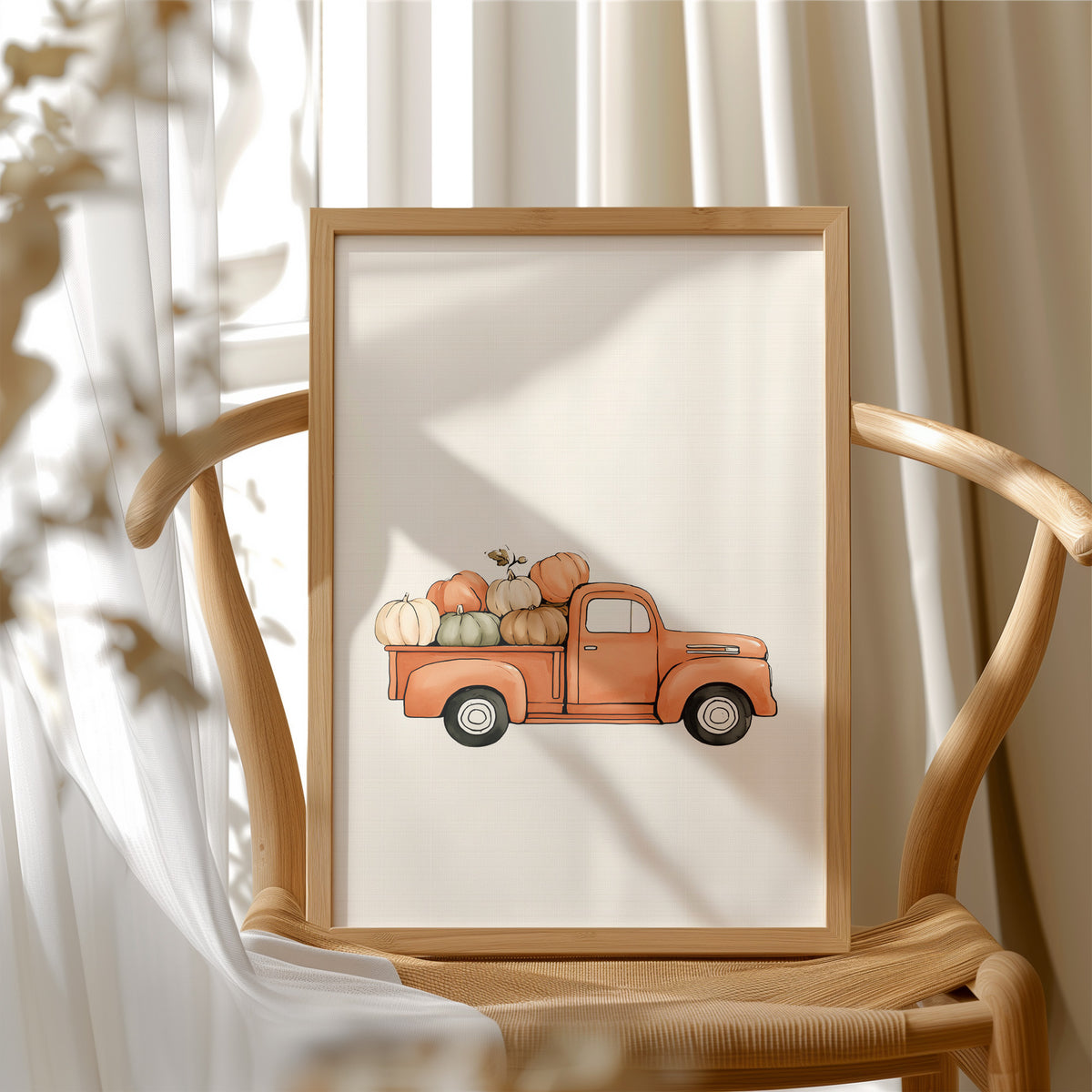 Last Load Up the Orchard Road, a small orange vintage pickup truck loaded with pumpkins and gourds on a cream ground, painted in soft watercolor, in a wood frame beside a wicker chair by a sunny window