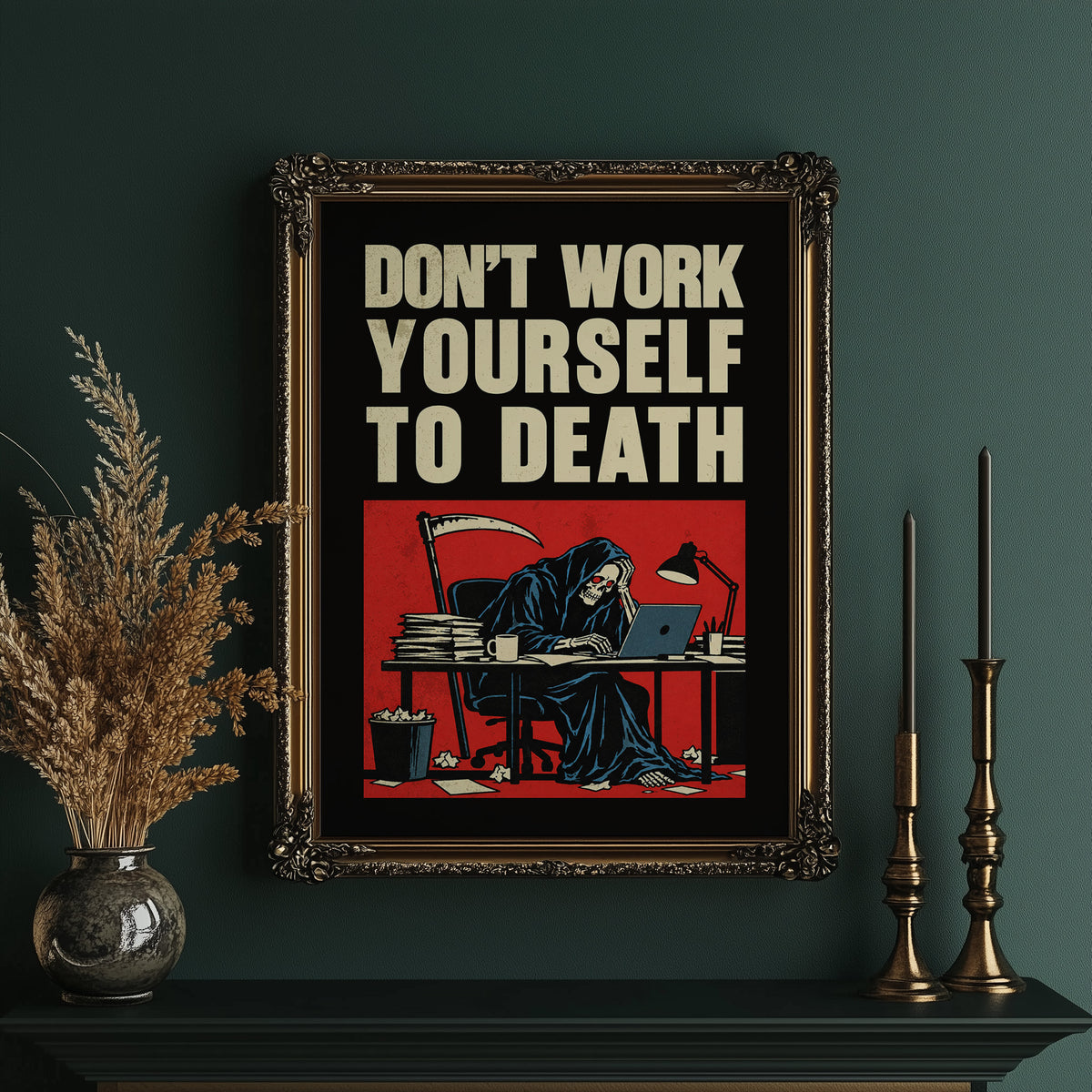 Let the Inbox Wait Till Monday, a hooded reaper hunched over a cluttered desk with a laptop and a stack of files, in a red panel with the lettering DON'T WORK YOURSELF TO DEATH in heavy cream capitals on black, in an ornate gold frame on a deep green wall beside tall brass candlesticks