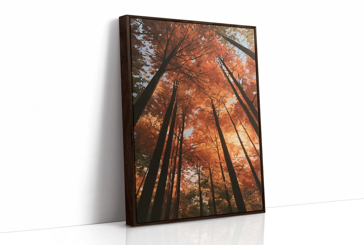 Look Up Into the Burning Wood, looking straight up through a canopy of tall dark trunks and orange autumn foliage, the pale sky glowing behind them, painted in rust, burnt orange and charcoal, as a framed canvas in a brown frame