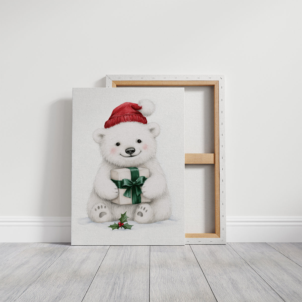 The Bear Cub Keeps a Secret, a small polar bear cub in a red knit hat hugging a green wrapped gift with a sprig of holly at its feet, on a soft cream ground, on a gallery canvas with wrapped edges leaning against a white wall