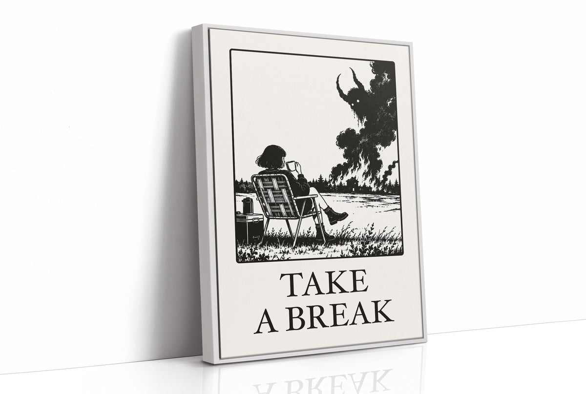 The Break Nobody Schedules, a figure in a deck chair under a broad tree in a black and cream line scene, with TAKE A BREAK in large serif capitals beneath, as a framed canvas in a white frame