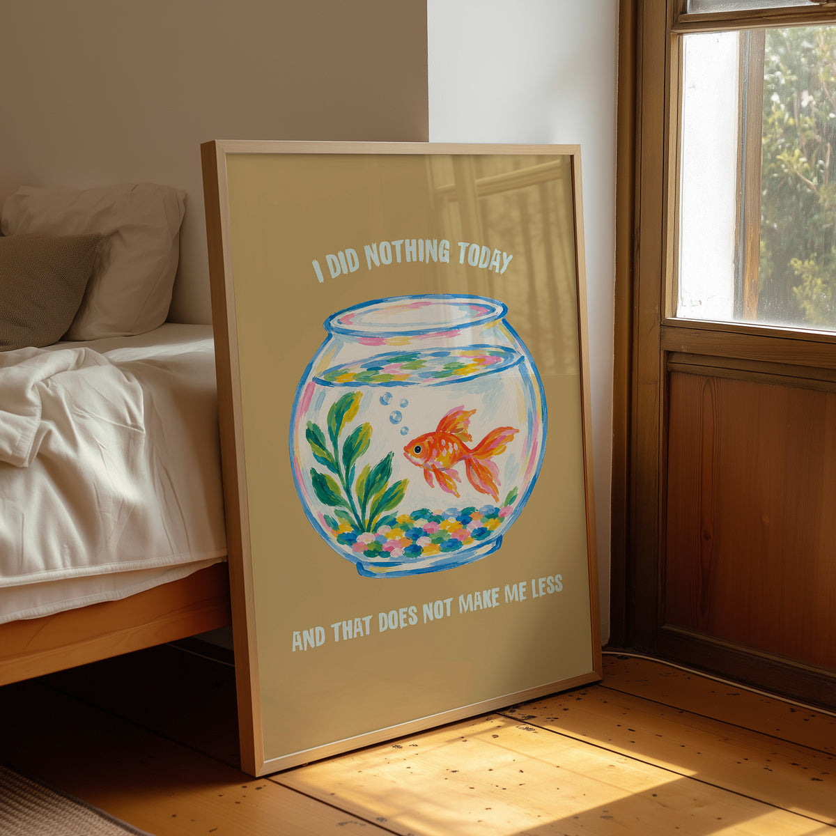 The Goldfish Takes the Afternoon, a goldfish circling a round bowl of pale blue water with green plants, with three lines of cream lettering on a mustard ground, in a flat playful illustrated style painted in mustard, blue and cream, leaning on a wood floor in a bedroom beside white linen bedding