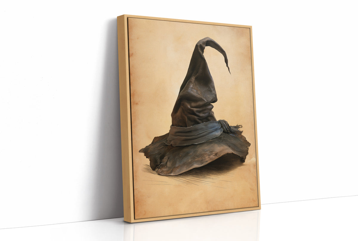 The Hat Left by the Door, a single pointed witch hat with a soft bend at the tip, sitting on a worn cream ground, painted in charcoal, brown and tan, as a framed canvas in a natural wood frame