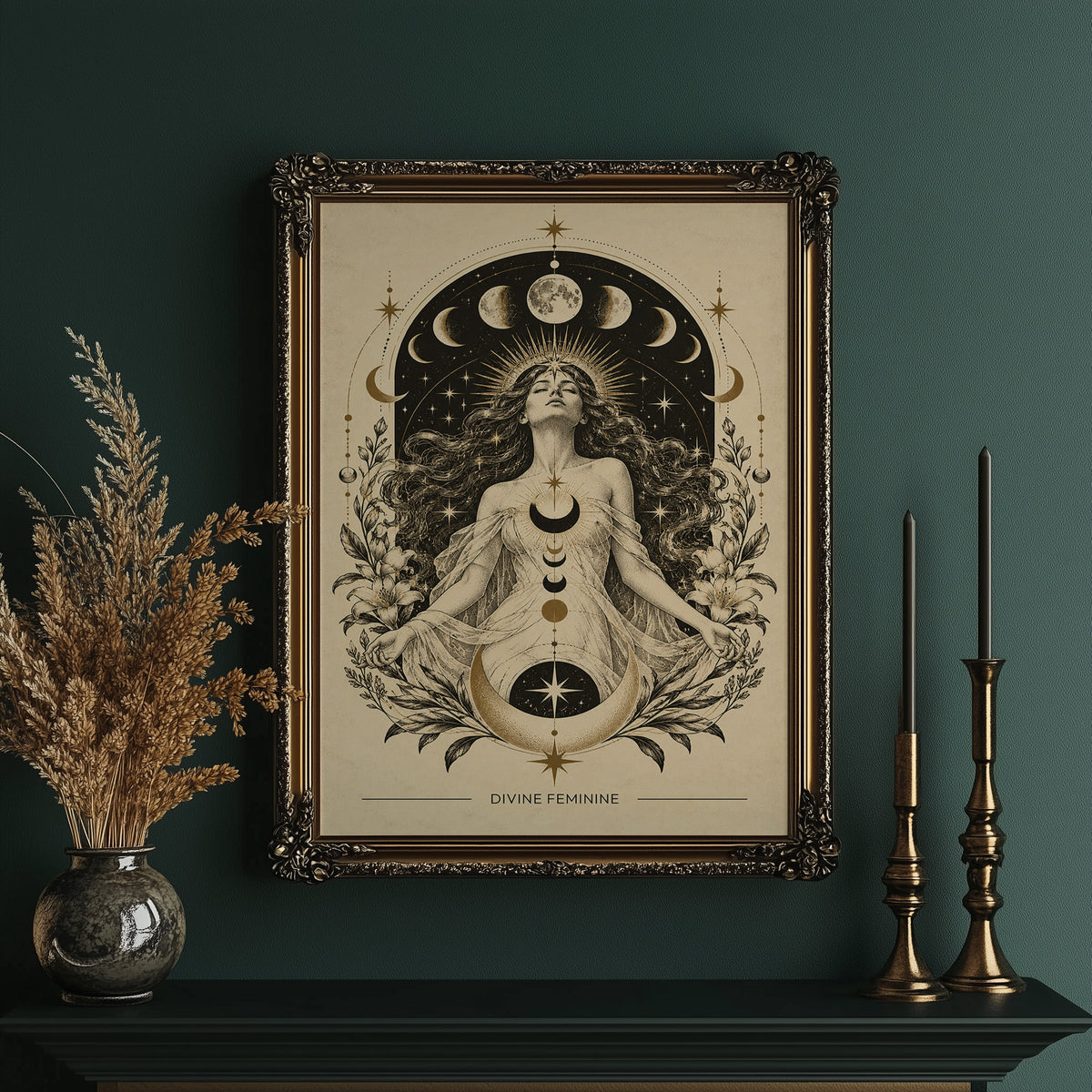 The Moon Woven Into Her Hair, a seated woman in quiet meditation crowned with a ring of crescent moons and surrounded by fern fronds, drawn in cream, charcoal and sepia with a deep brown border and small text at the base, in an ornate gold frame on a deep green wall beside tall brass candlesticks