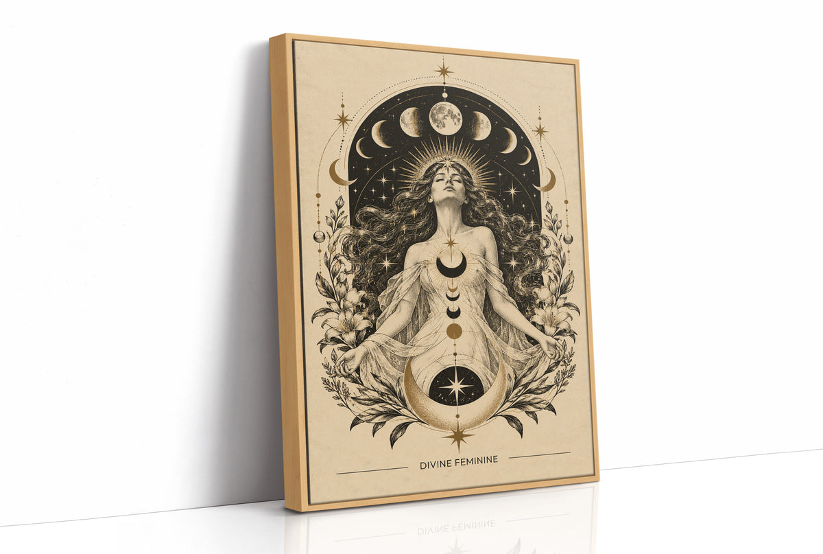 The Moon Woven Into Her Hair, a seated woman in quiet meditation crowned with a ring of crescent moons and surrounded by fern fronds, drawn in cream, charcoal and sepia with a deep brown border and small text at the base, as a framed canvas in a natural wood frame