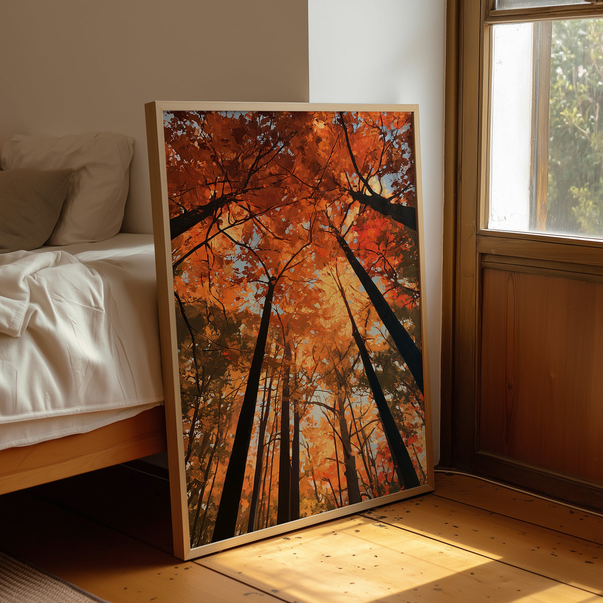The Woods Blaze Overhead, a looking up view of tall trees with fiery red and orange autumn canopy and a sky of soft light, painted in flame red and burnt gold, leaning on a wood floor in a bedroom beside white linen bedding