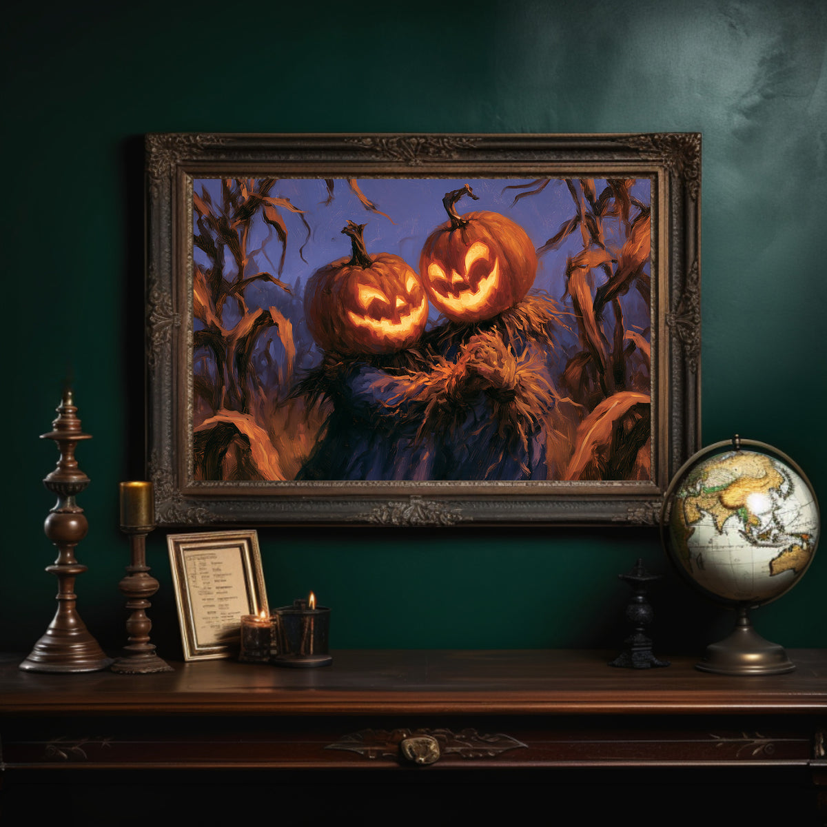 Two Lanterns Keeping Watch, two carved pumpkins glowing at the end of a cornfield under a deep blue dusk, painted in indigo, cornfield gold and warm orange, in an ornate dark frame on a deep green wall above a mantel with a globe and candles