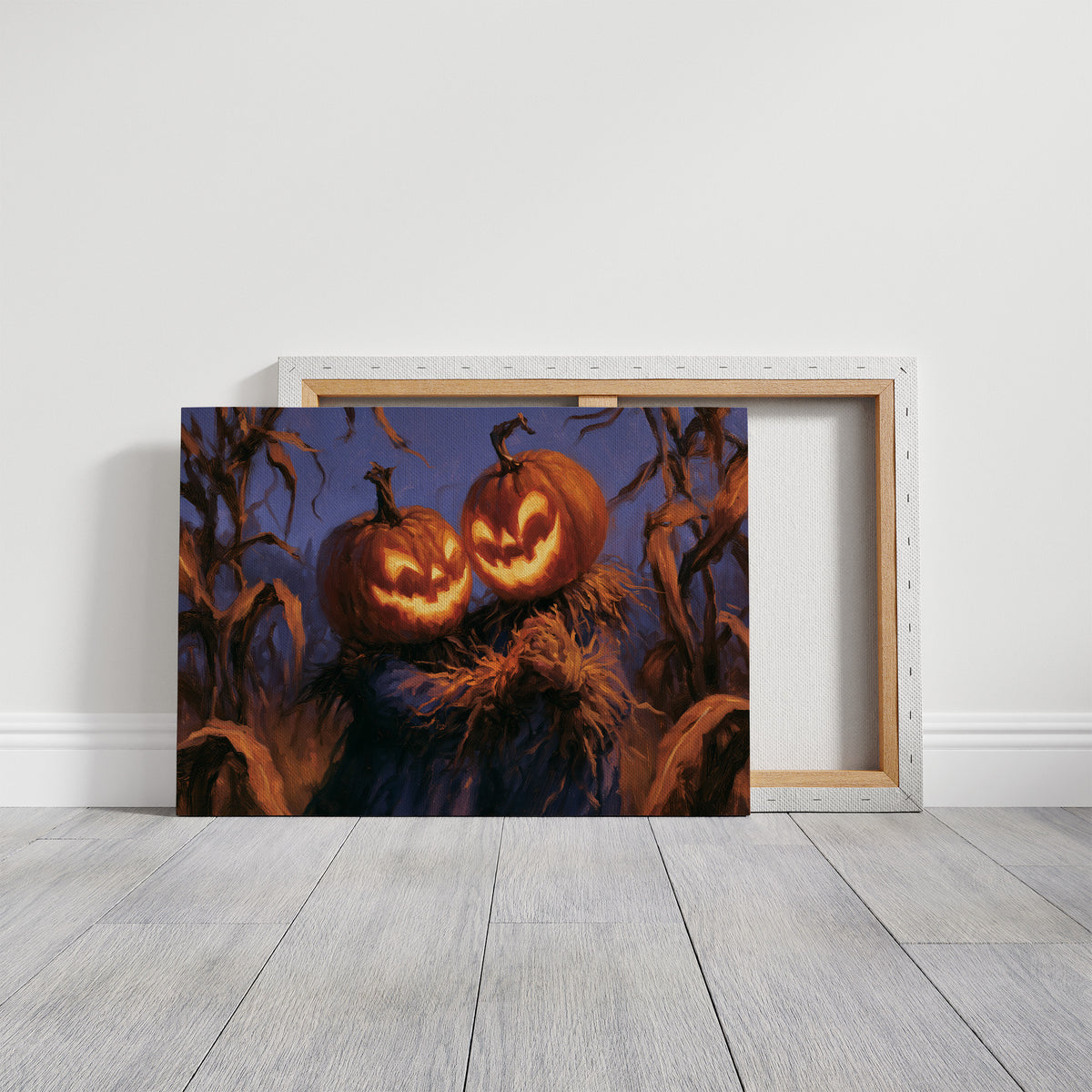 Two Lanterns Keeping Watch, two carved pumpkins glowing at the end of a cornfield under a deep blue dusk, painted in indigo, cornfield gold and warm orange, on a gallery canvas with wrapped edges leaning against a white wall