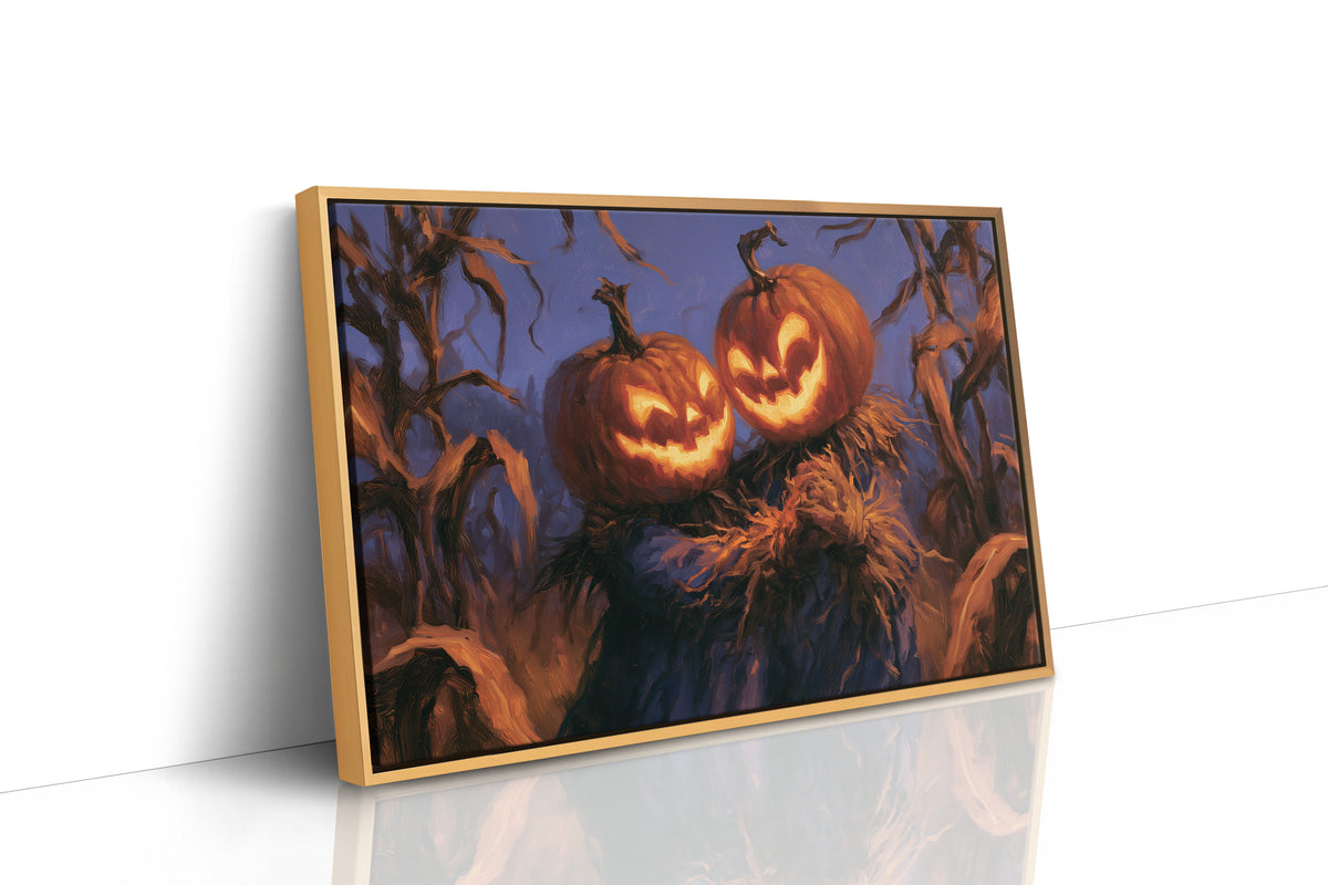 Two Lanterns Keeping Watch, two carved pumpkins glowing at the end of a cornfield under a deep blue dusk, painted in indigo, cornfield gold and warm orange, as a framed canvas in a natural wood frame