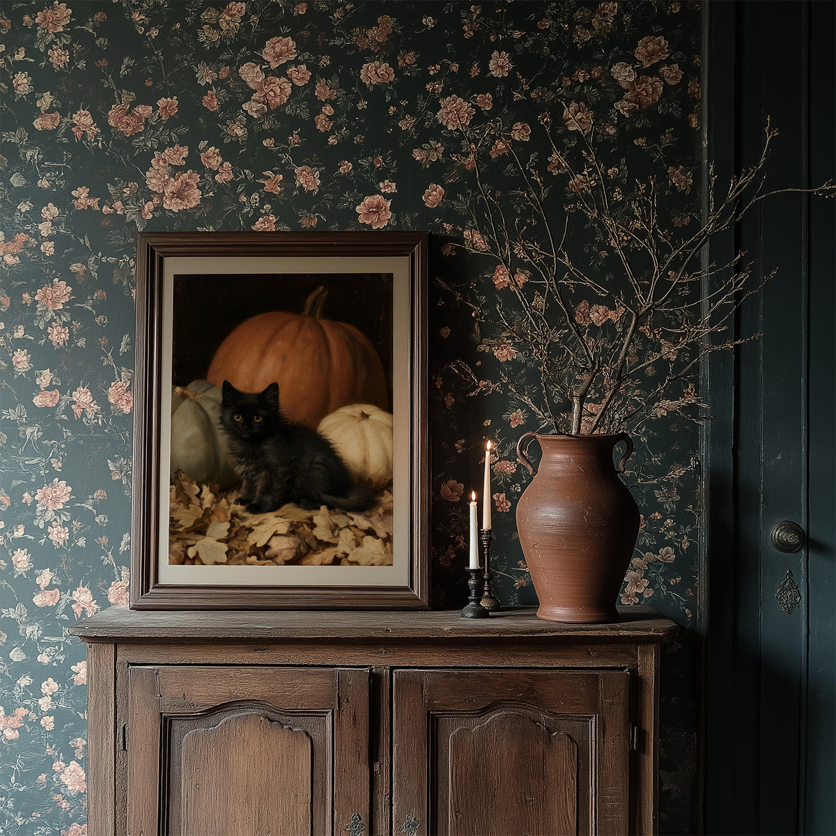 Watchful Eyes in the Autumn Hush, a black cat curled among fallen leaves in front of a large orange pumpkin, with a pale pumpkin beside it, painted in a dark oil portrait style with warm umber and gold, in a dark wood frame on a floral wallpaper wall above a rustic cabinet and a vase