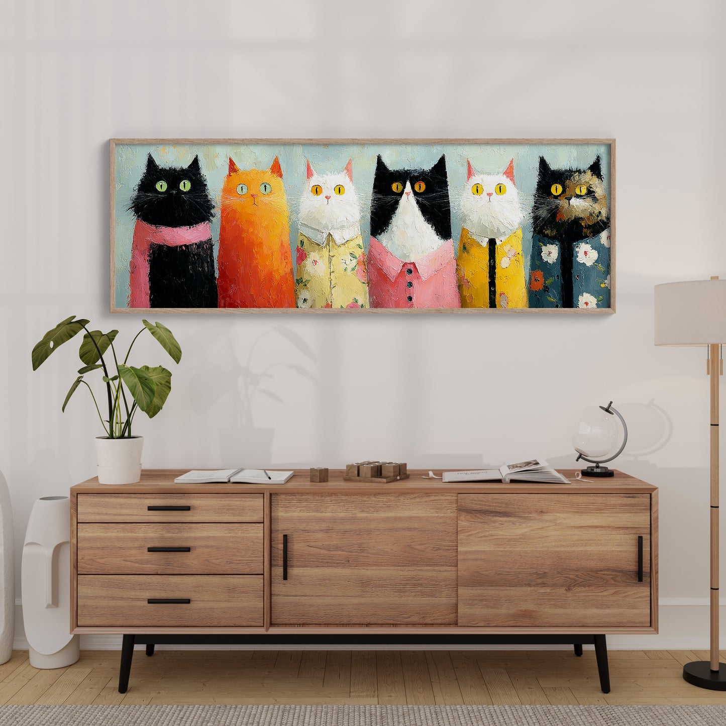 Dressed-Up Cats in a Row
