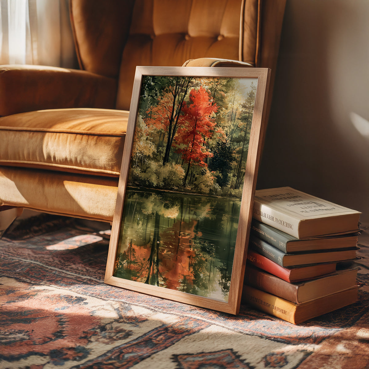 Mirror Mirror On The Pond, framed print leaning on a leather armchair beside a stack of books