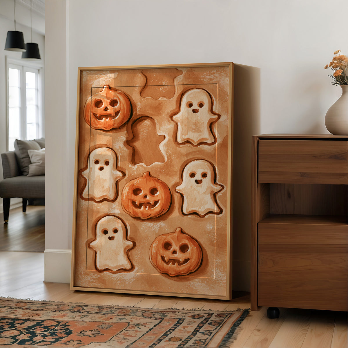 Two Ghosts Already Escaped The Dough, large framed print leaning on a white wall beside a wood cabinet