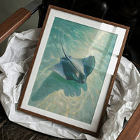 Spotted Grace Glides Through Jade Waters