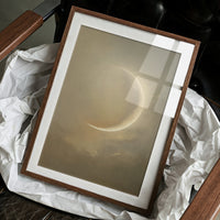 Crescent Moon Bathes In Golden Mist