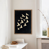 Ivory Wings Against Midnight Sky