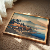 Coastal Village Greets Mountain Dawn