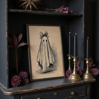 Haunted Charm Wears A Bow