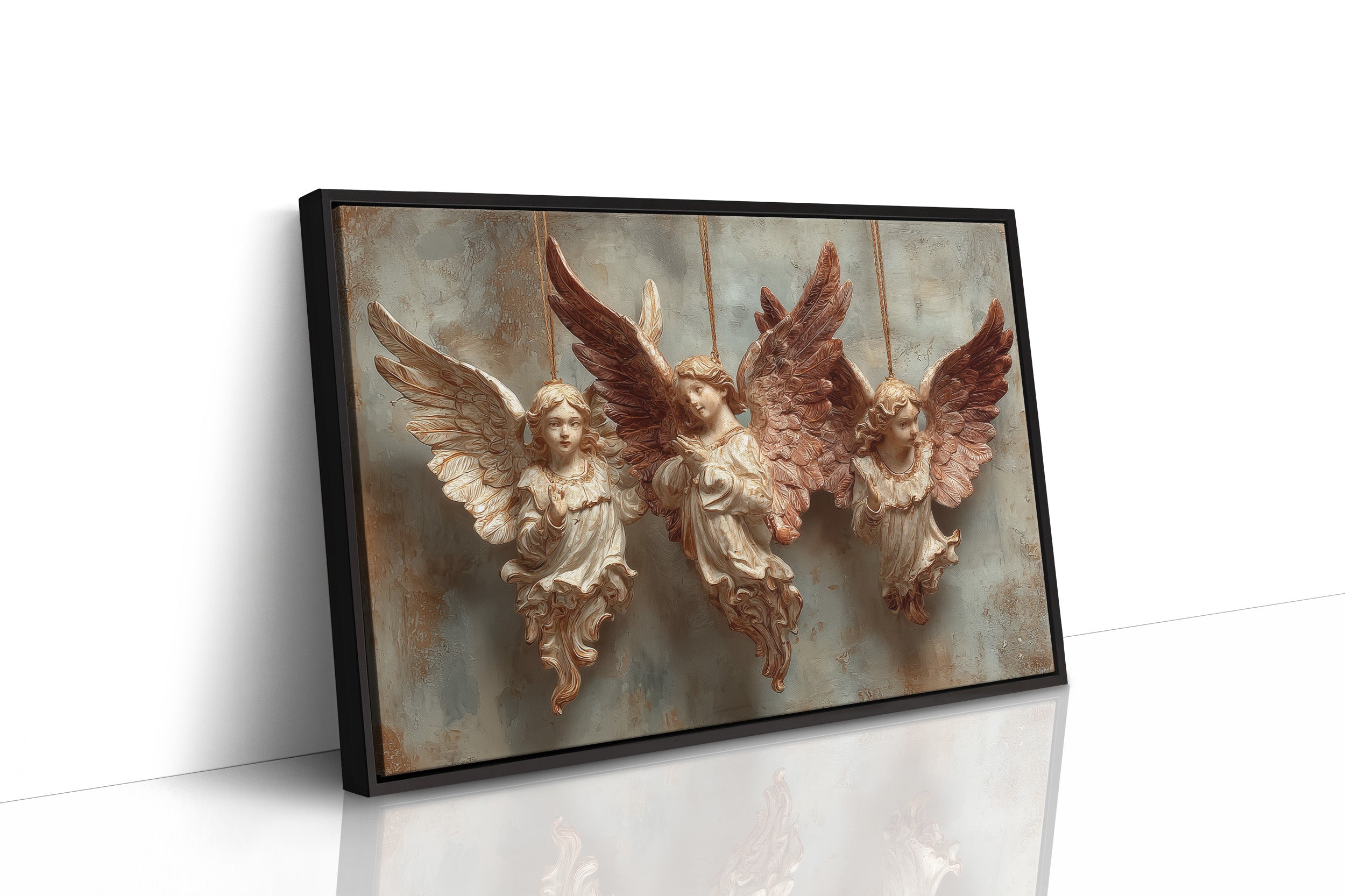 Three Carved Angels on Strings