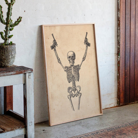 Skeletal design on a wooden board leaning against a wall with a plant and rustic furniture.