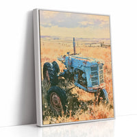 Old Blue: Sun-Kissed Tractor in the Prairie Grass