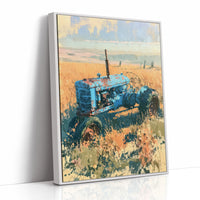 Faded Blue: Tractor Lost in Golden Grass