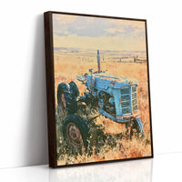 Old Blue: Sun-Kissed Tractor in the Prairie Grass