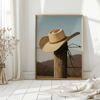 Cowboy Hat on Fence Post
