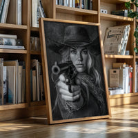 Framed artwork of a woman holding a gun in front of a bookshelf