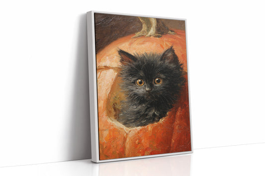 Curious Kitten in Pumpkin