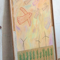 Red Bird Soars Above Wind Fields