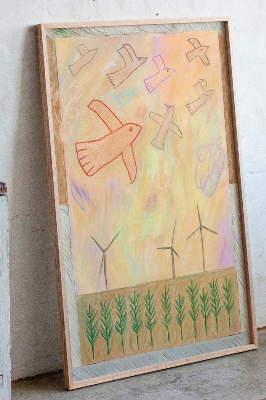 Red Bird Soars Above Wind Fields
