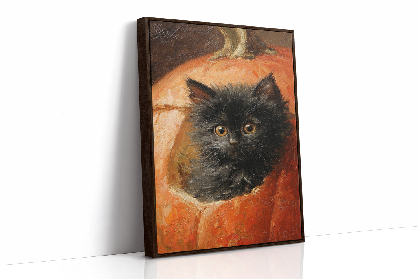 Curious Kitten in Pumpkin