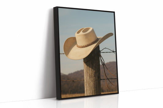 Cowboy Hat on Fence Post