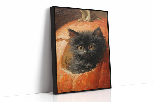 Curious Kitten in Pumpkin