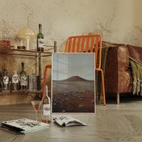 Solitary Peak In Rust And Stone