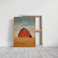 Red Barn Under Prairie Skies