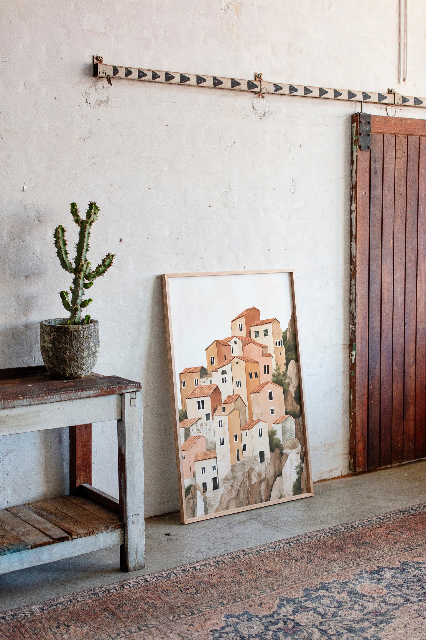 Sunlit Cliffside Village in Warm Earth Tones