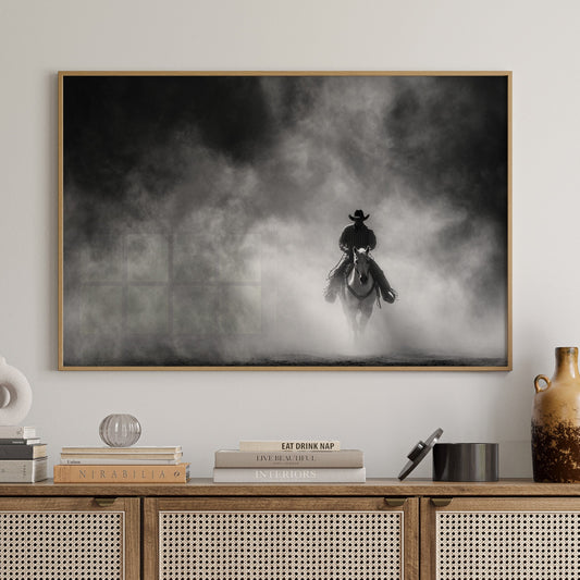 Wooden cabinet with decorative items and a framed black and white artwork on a wall.